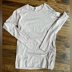 Light pink lululemon swiftly tech long sleeve shirt